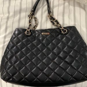 Quilted Kate Spade black leather with prime interior